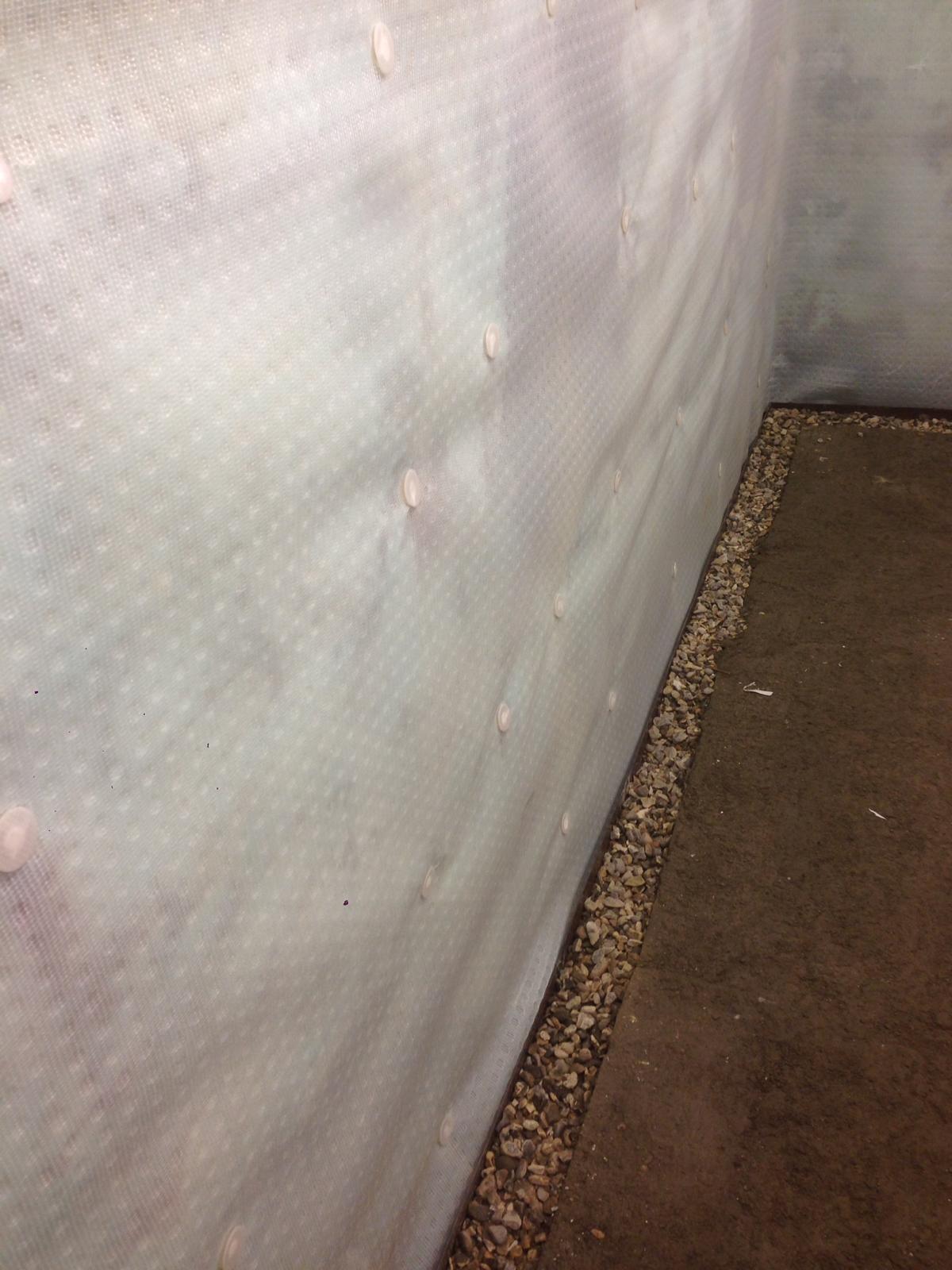 Cavity drain membrane and drainage channel installed