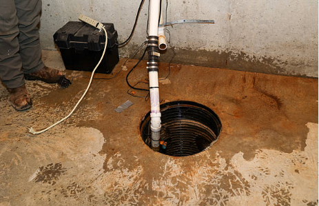 Sump pump installed in basement floor